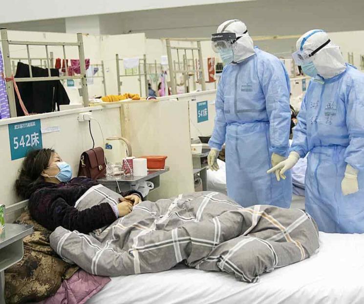 China reduce nivel de respuesta a pandemia