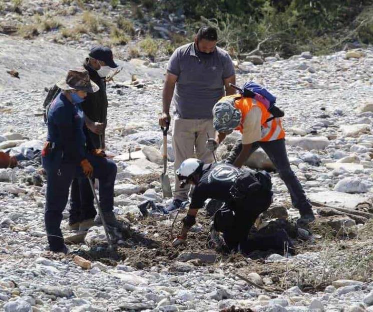 Hallan restos humanos en río Pesquería