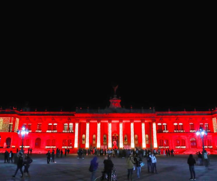 Iluminan Palacio de rojo por el combate al VIH