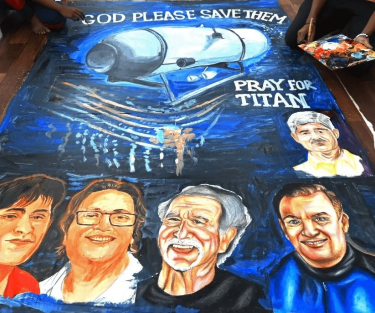 Jóvenes pintan mural en memoria a víctimas del Titan