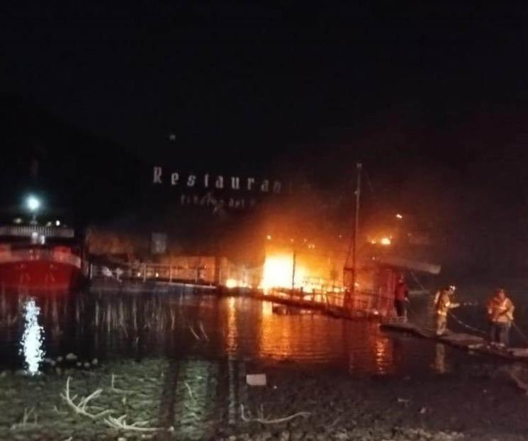 Indagan incendio presuntamente provocado en bar de Santiago