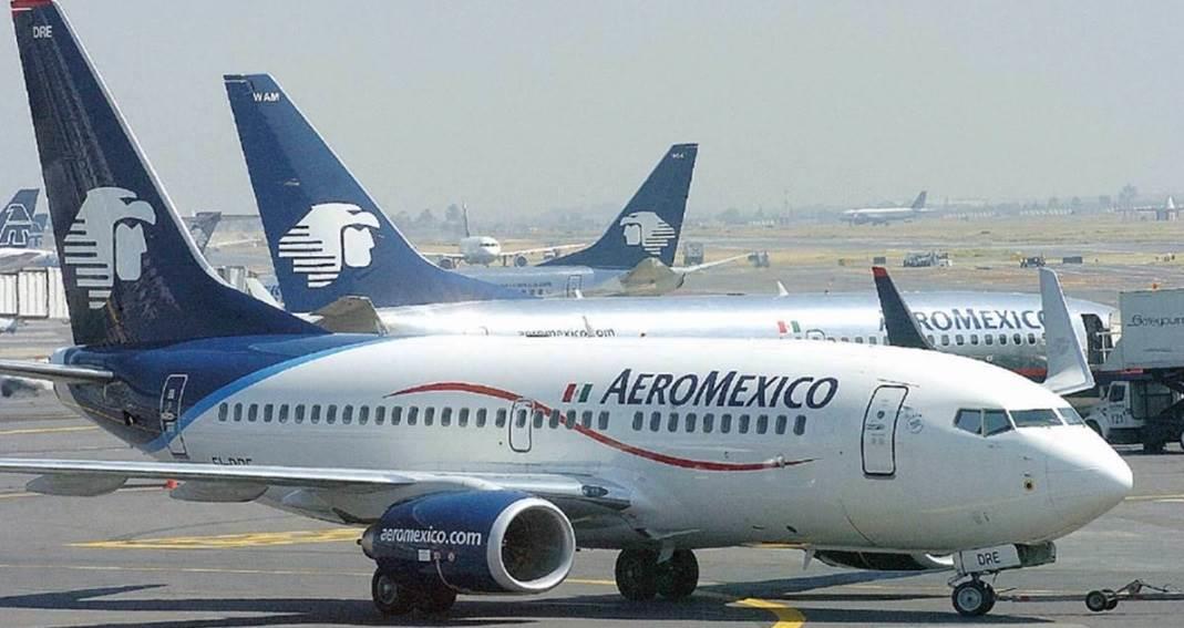 Detienen a pasajero de Aeroméxico que saltó sobre ala de avión