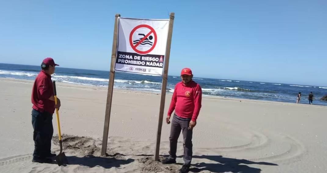 Rescatan a turistas arrastrados por corriente en playas de Mazatlán