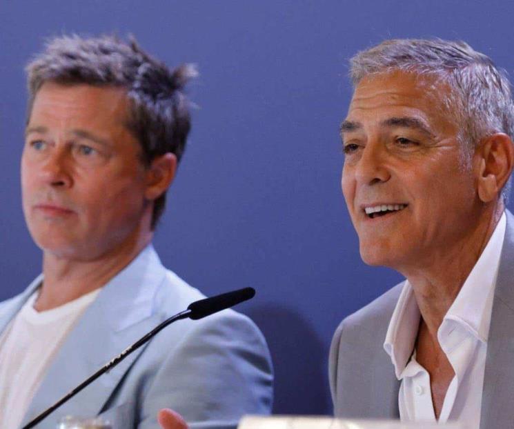 George Clooney y Brad Pitt roban miradas en el Festival de Venecia